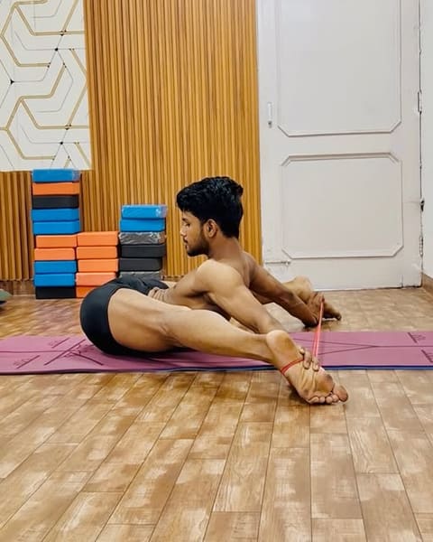 Advanced seated asana practice in the studio
