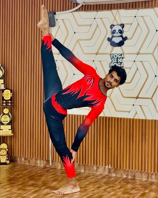 Head trainer Dev Gohar in a standing split at the Yoga Se Hoga studio, Mohali
